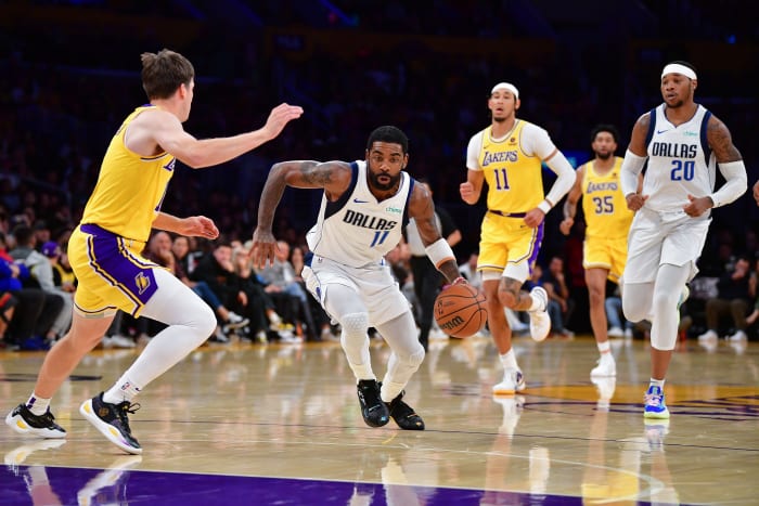 Dallas Mavericks star Kyrie Irving puts pressure on the Los Angeles Lakers' defense in transition.